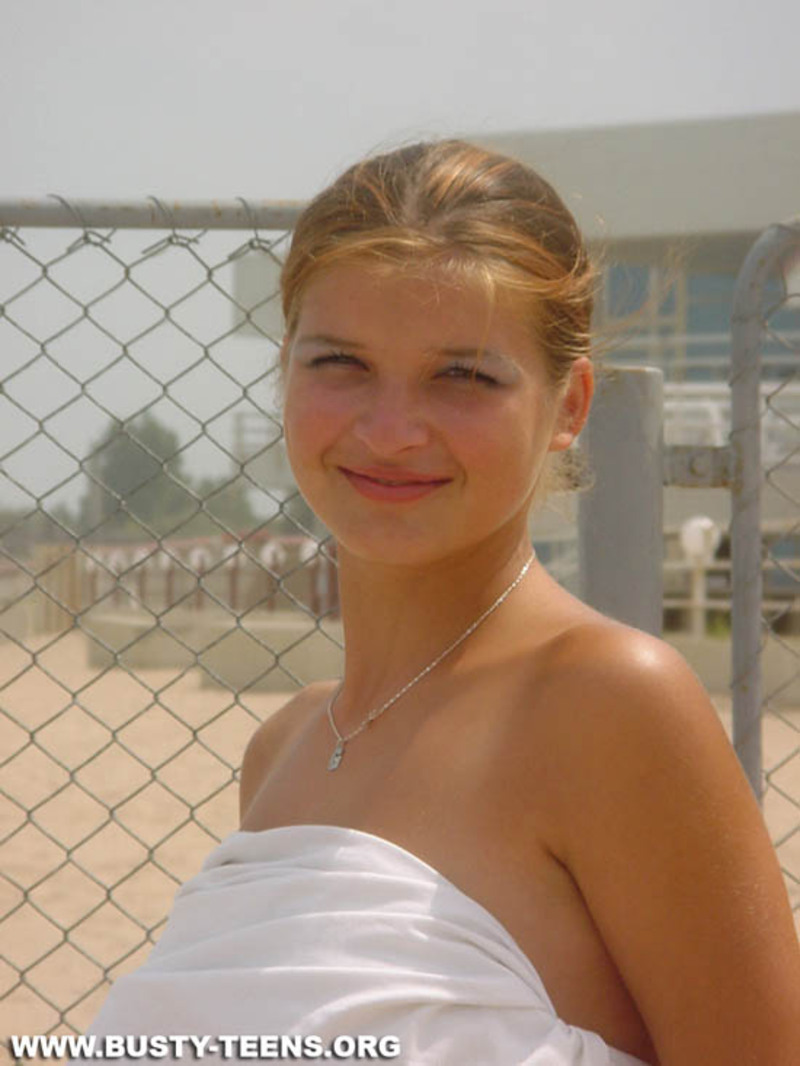 Busty teen on the beach - 11