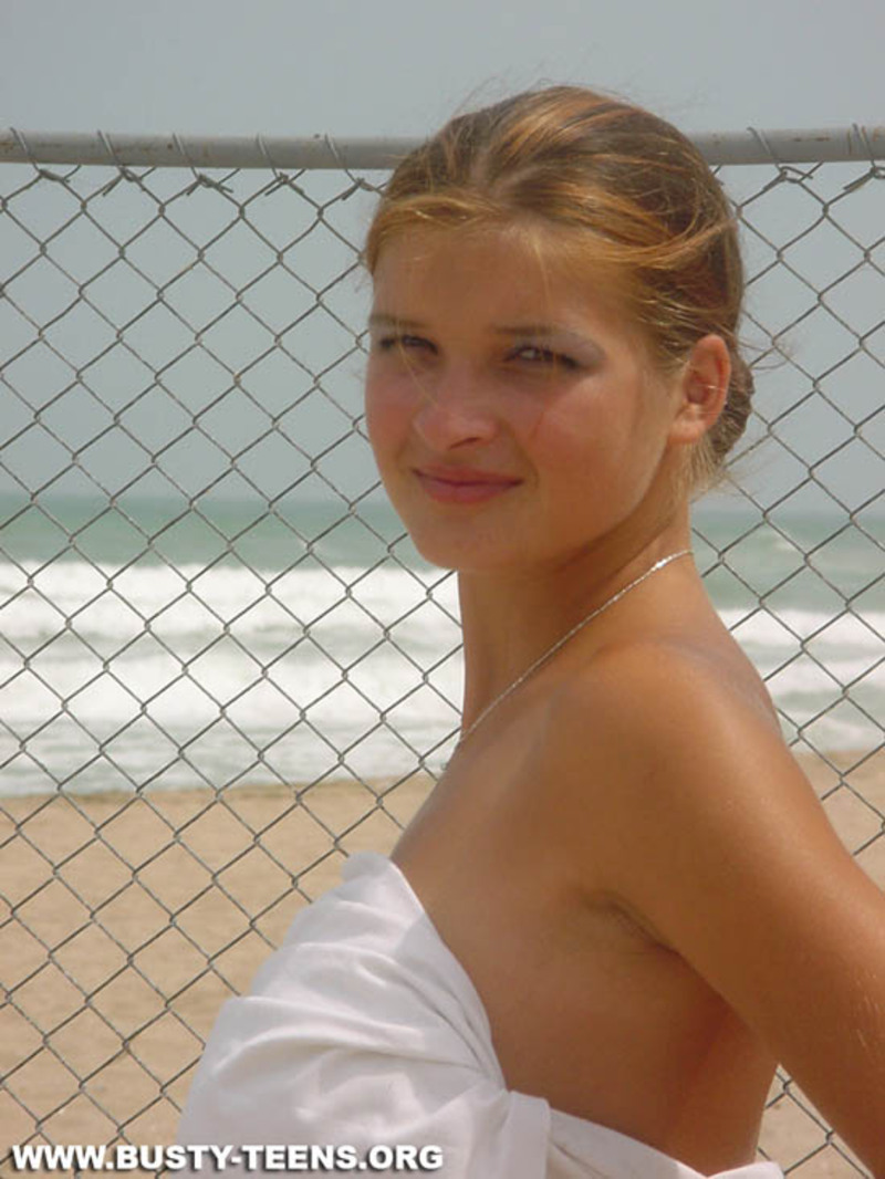 Busty teen on the beach - 12