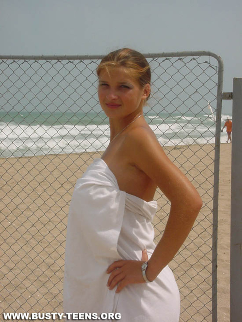 Busty teen on the beach - 13